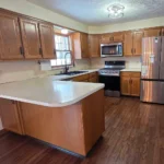 How to Paint Unfinished Kitchen Cabinets in 2026